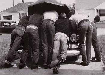 BOYS WITH THEIR FIRST CAR